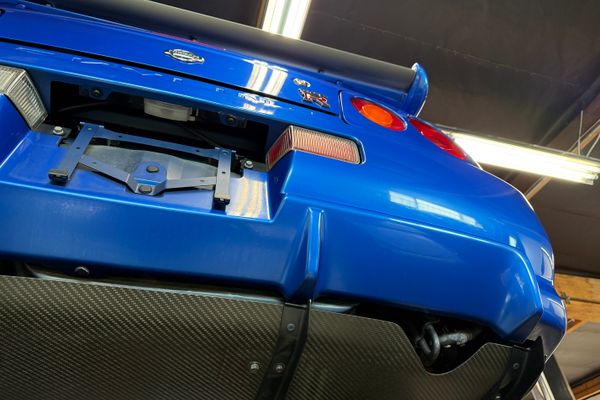 blue 2001 Nissan Skyline GT-R R34 V-spec 2 for sale by Sandbox Motors