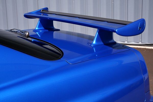 blue 2001 Nissan Skyline GT-R R34 V-spec 2 for sale by Sandbox Motors