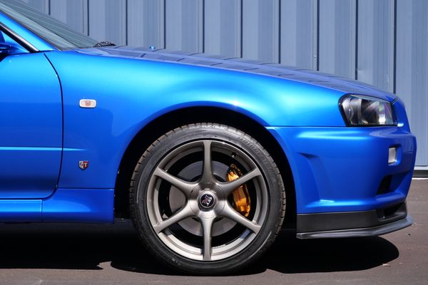 blue 2001 Nissan Skyline GT-R R34 V-spec 2 for sale by Sandbox Motors