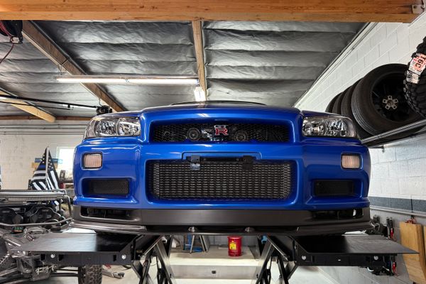 blue 2001 Nissan Skyline GT-R R34 V-spec 2 for sale by Sandbox Motors