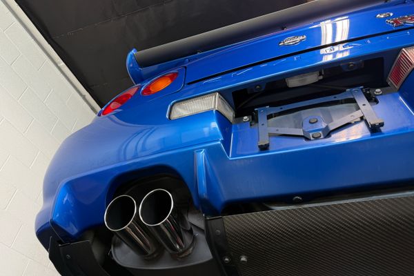 blue 2001 Nissan Skyline GT-R R34 V-spec 2 for sale by Sandbox Motors