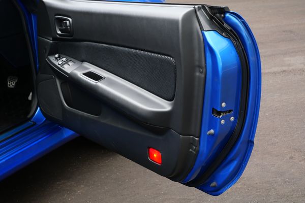 blue 2001 Nissan Skyline GT-R R34 V-spec 2 for sale by Sandbox Motors