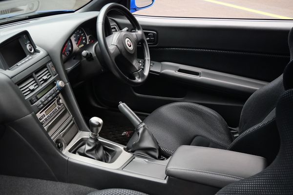 blue 2001 Nissan Skyline GT-R R34 V-spec 2 for sale by Sandbox Motors