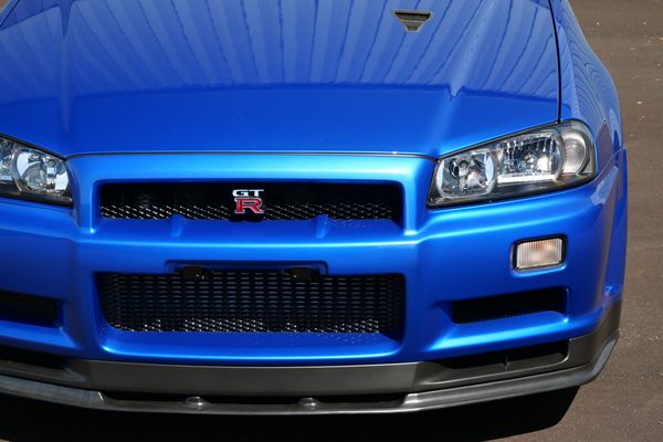 blue 2001 Nissan Skyline GT-R R34 V-spec 2 for sale by Sandbox Motors