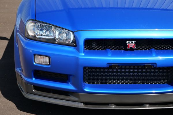 blue 2001 Nissan Skyline GT-R R34 V-spec 2 for sale by Sandbox Motors