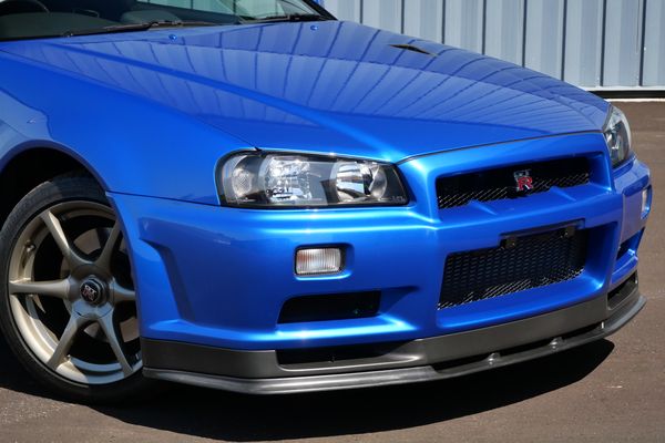 blue 2001 Nissan Skyline GT-R R34 V-spec 2 for sale by Sandbox Motors