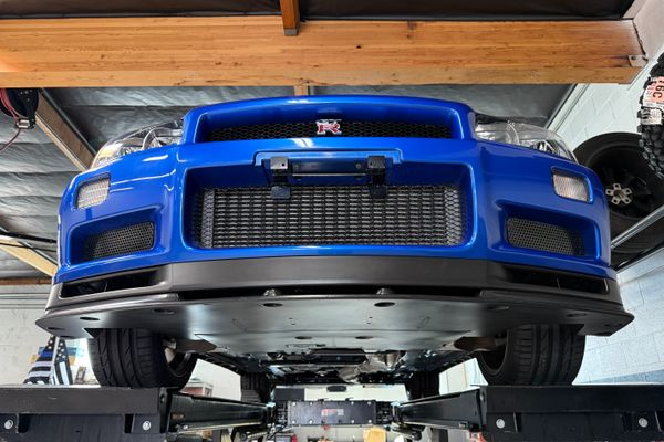 blue 2001 Nissan Skyline GT-R R34 V-spec 2 for sale by Sandbox Motors