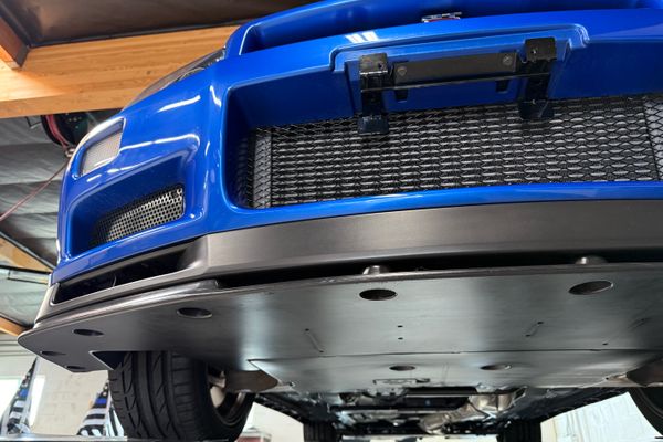 blue 2001 Nissan Skyline GT-R R34 V-spec 2 for sale by Sandbox Motors