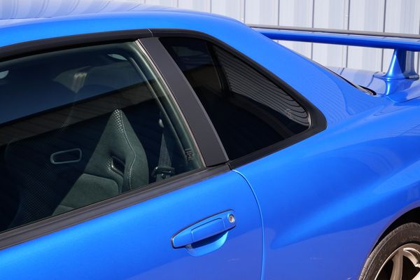 blue 2001 Nissan Skyline GT-R R34 V-spec 2 for sale by Sandbox Motors