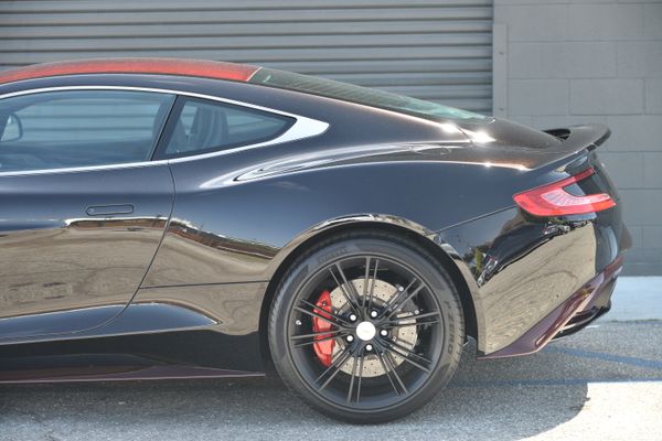 Black and red 2015 Aston Martin Vanquish Q Collection for sale by Sandbox Motors.