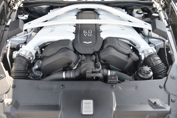 Black and red 2015 Aston Martin Vanquish Q Collection for sale by Sandbox Motors.