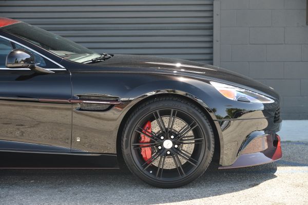 Black and red 2015 Aston Martin Vanquish Q Collection for sale by Sandbox Motors.