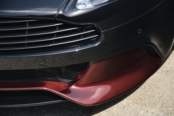 Black and red 2015 Aston Martin Vanquish Q Collection for sale by Sandbox Motors.