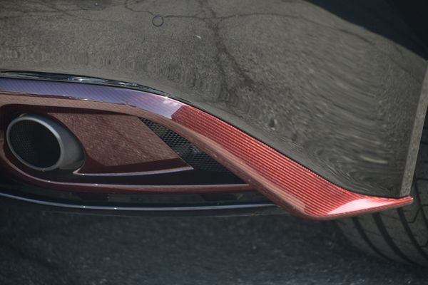 Black and red 2015 Aston Martin Vanquish Q Collection for sale by Sandbox Motors.