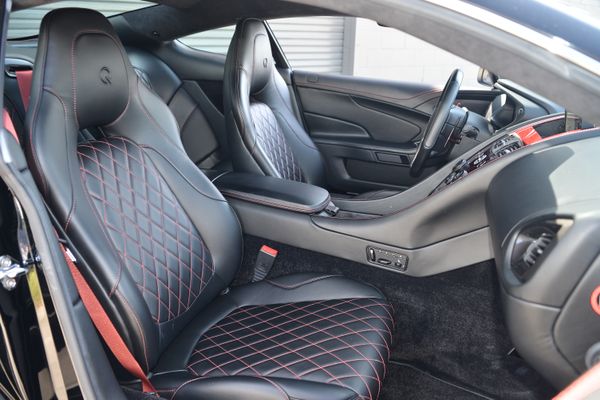 Black and red 2015 Aston Martin Vanquish Q Collection for sale by Sandbox Motors.