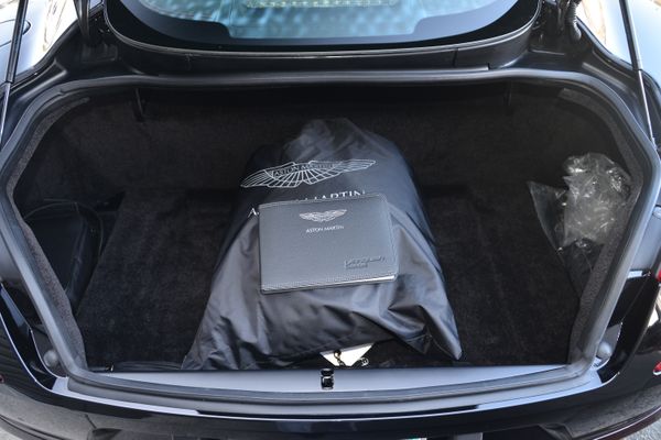 Black and red 2015 Aston Martin Vanquish Q Collection for sale by Sandbox Motors.