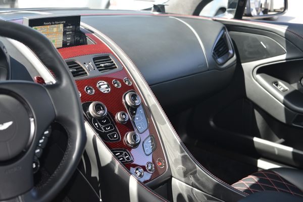 Black and red 2015 Aston Martin Vanquish Q Collection for sale by Sandbox Motors.