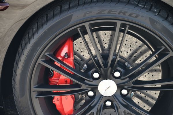 Black and red 2015 Aston Martin Vanquish Q Collection for sale by Sandbox Motors.