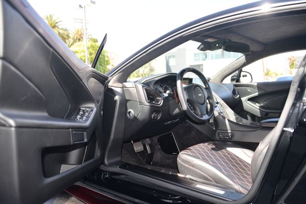 Black and red 2015 Aston Martin Vanquish Q Collection for sale by Sandbox Motors.